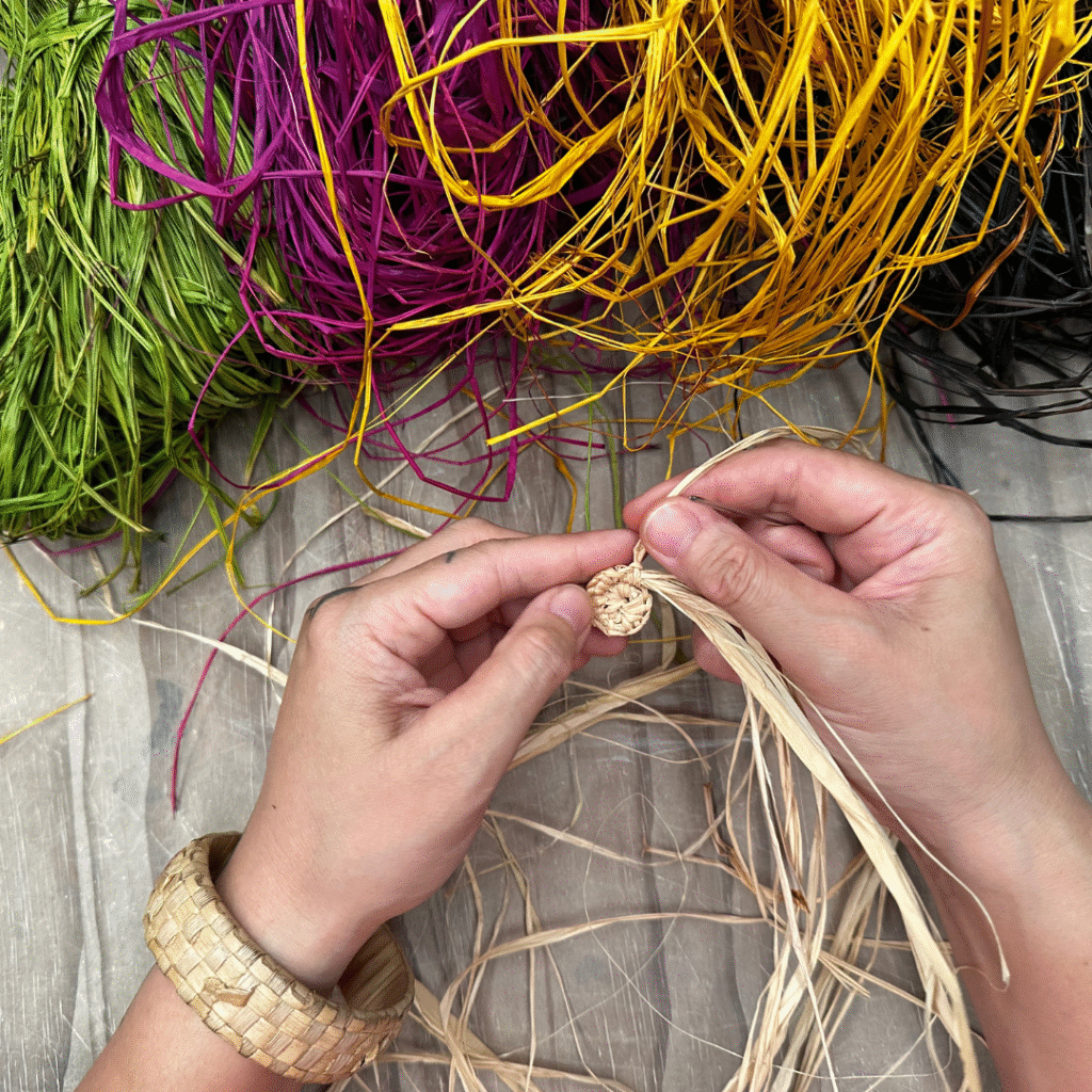 Weaving materials for making earrings with Maryann Talia Pau