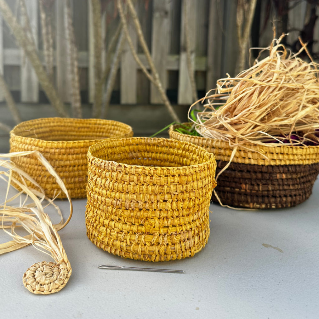 Raffia baskets woven by Maryann Talia Pau. Book and learn today.